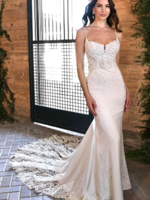 SEXY FIT-AND-FLARE WEDDING DRESS WITH SHEER CUTOUTS AND OPEN BACK